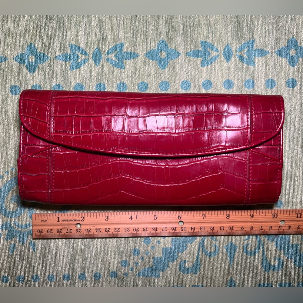 Faux reptile red clutch.  Such a fun statement accessory for any outfit!